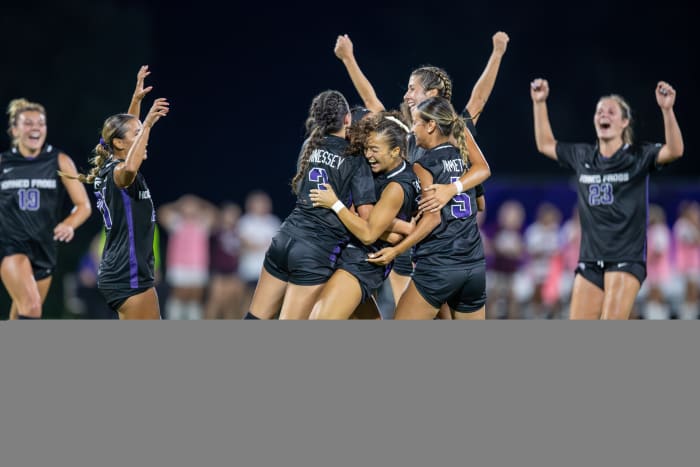 The Horned Frogs celebrate Seven Castain's game-winning goal in the 87th minute.